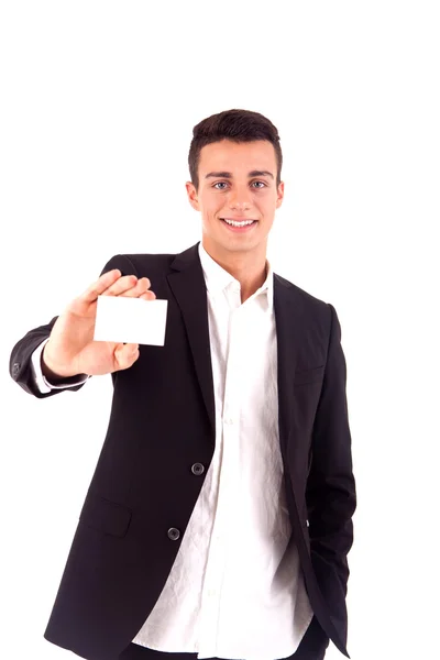 Joven hombre de negocios entregando una tarjeta de visita en blanco sobre la espalda blanca —  Fotos de Stock