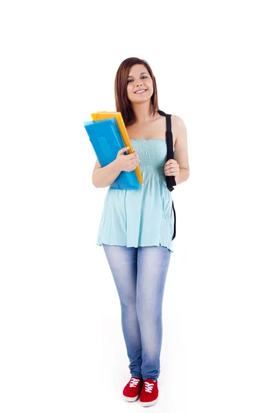 Universitaria sosteniendo libros y sonriendo — Foto de Stock