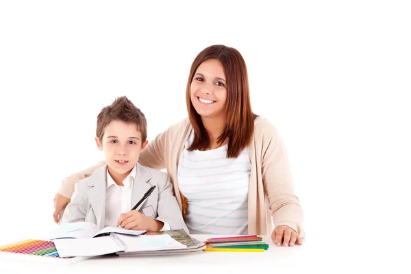 Mulher feliz, mãe ou professor ajudando criança com trabalhos escolares — Fotografia de Stock