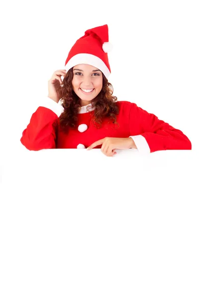 Beautiful christmas woman leaning on blank sign — Stock Photo, Image