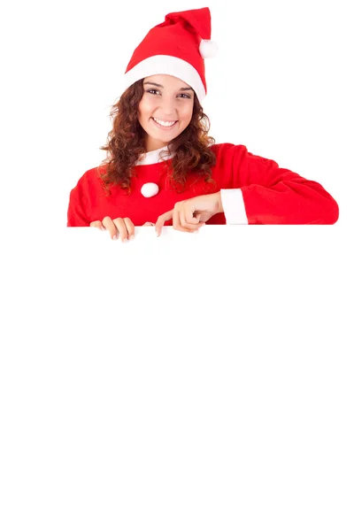 Schöne Weihnachtsfrau lehnt sich an leeres Schild — Stockfoto