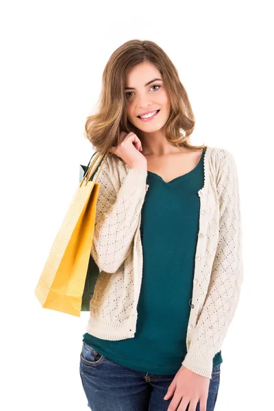 Mujer hermosa sosteniendo bolsas de compras — Foto de Stock