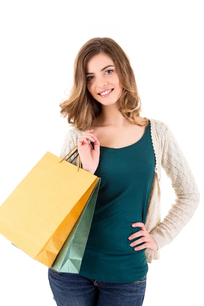 Mujer hermosa sosteniendo bolsas de compras — Foto de Stock