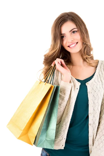 Mujer hermosa sosteniendo bolsas de compras —  Fotos de Stock