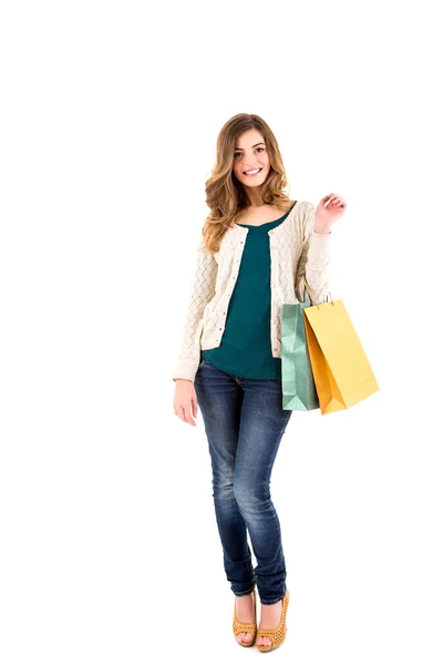 Mujer hermosa sosteniendo bolsas de compras — Foto de Stock