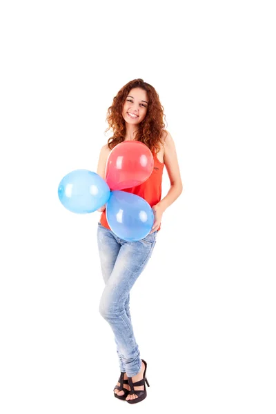 Feliz hermosa mujer sosteniendo globos —  Fotos de Stock