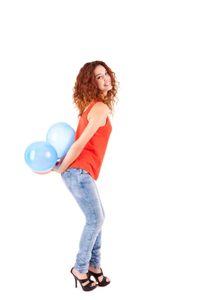 Feliz hermosa mujer sosteniendo globos — Foto de Stock