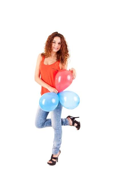 Feliz hermosa mujer sosteniendo globos —  Fotos de Stock