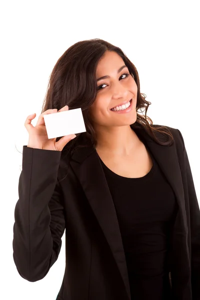 Friendly woman holding a business card and smiling — Stock Photo, Image