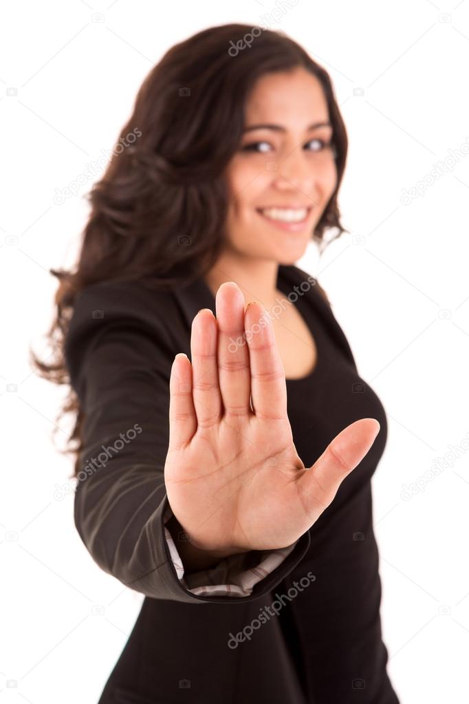 Businesswoman making stop sign on white background