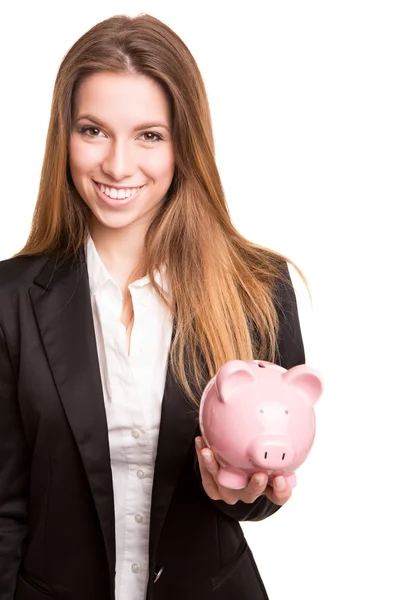 Sorrindo mulher de negócios com um banco porquinho — Fotografia de Stock