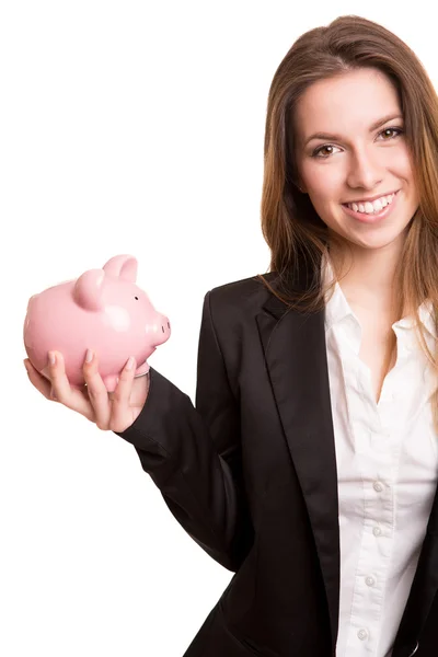 Mujer de negocios sonriente con una alcancía — Foto de Stock