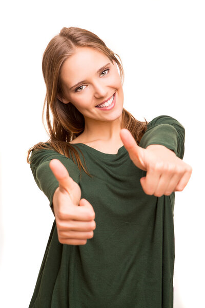 Beautiful blonde woman showing thumbs up