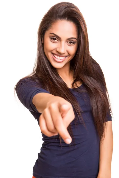 Sonriente mezcla raza mujer apuntando dedo hacia adelante — Foto de Stock