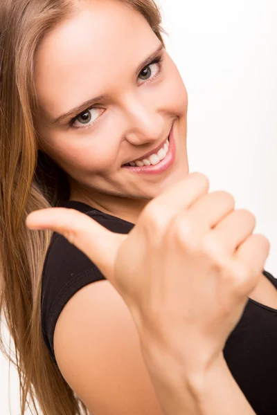 Mooie vrouw doen thmubs teken — Stockfoto