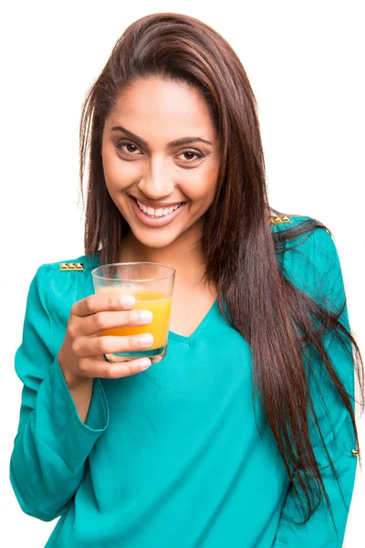 Beautiful mix race woman drinking juice — Stock Photo, Image