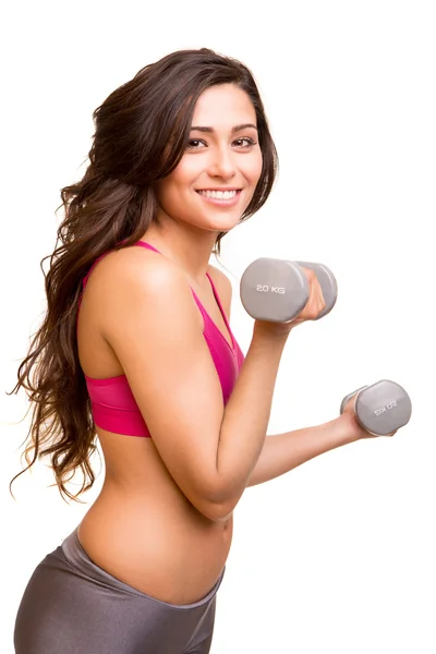 Attractive fitness woman lifting weights — Stock Photo, Image