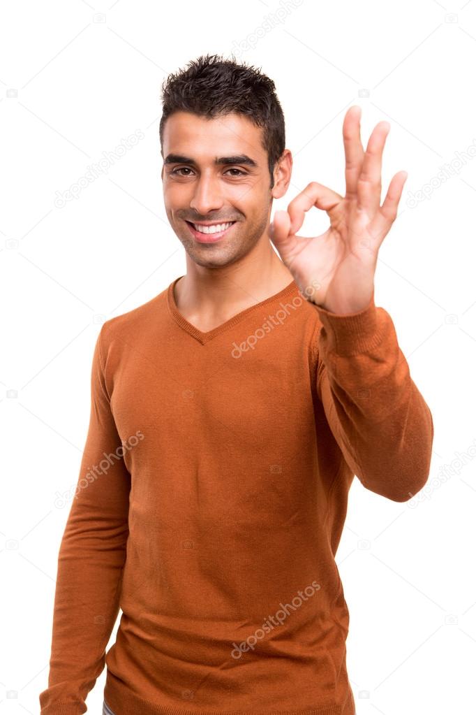 Smiling guy showing Ok sign