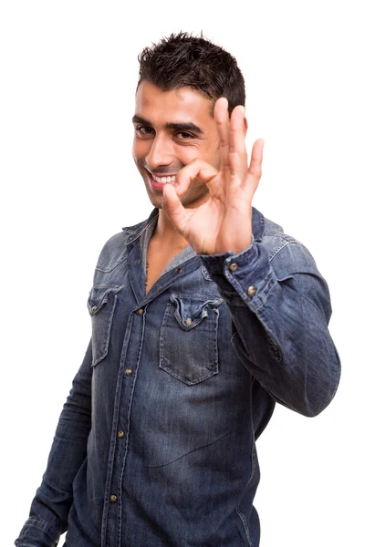 Portrait of a young man showing Ok sign — Stock Photo, Image