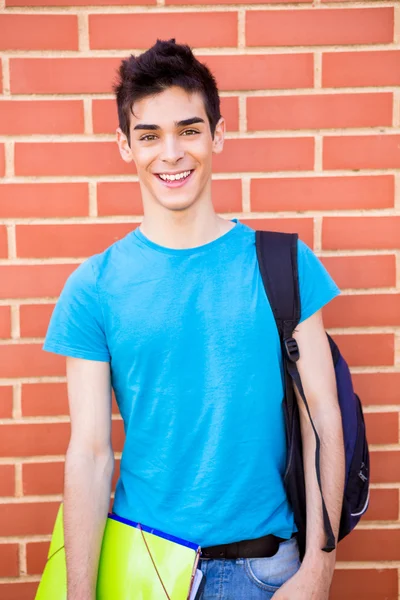 Beautiful young student in campus — Stock Photo, Image