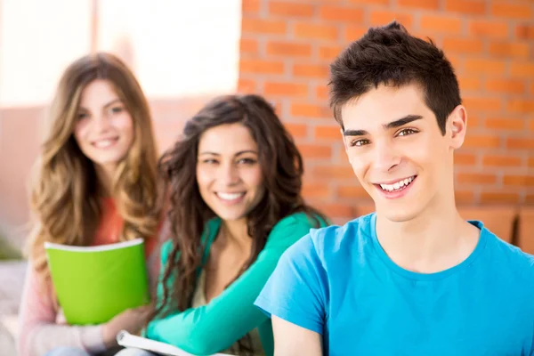 Young group of students in campus — Stock Photo, Image