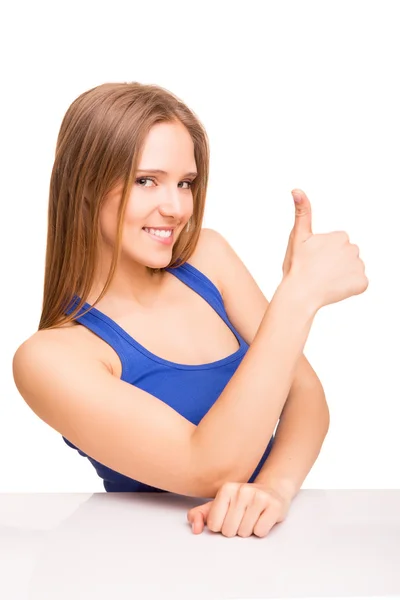 Портрет усміхненої жінки, що показує великі пальці вгору — стокове фото