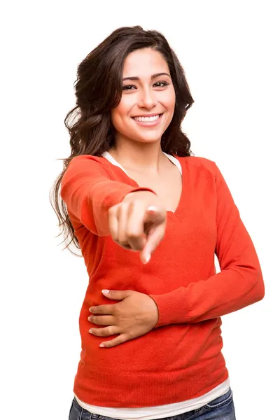 Young woman pointing to the front — Stock Photo, Image