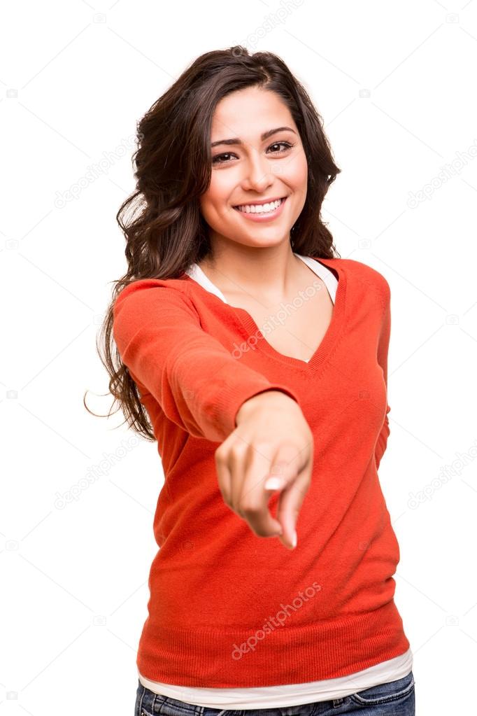 Young woman pointing to the front