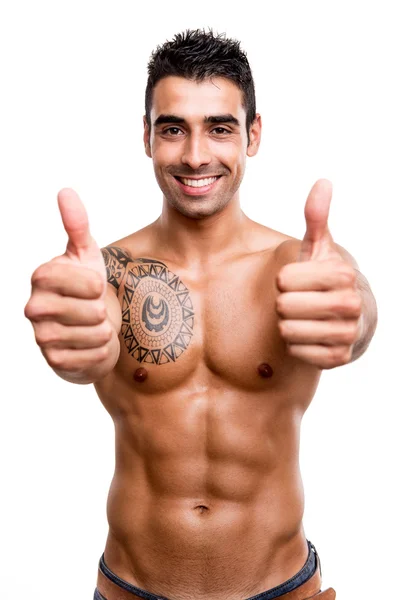 Fit man showing thumbs up — Stock Photo, Image