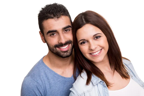 Casal posando sobre fundo branco — Fotografia de Stock