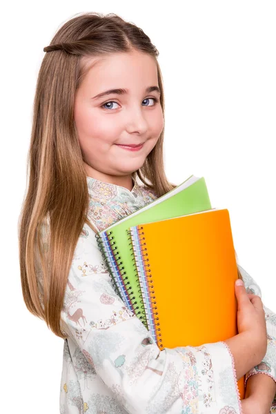 Pequeño estudiante sosteniendo cuaderno —  Fotos de Stock