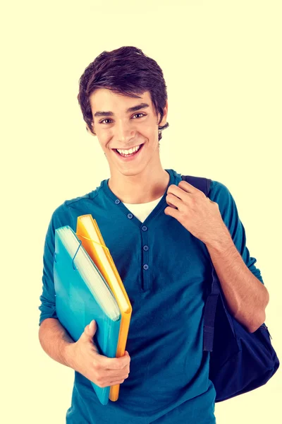 Young happy student carrying books — Stock Photo, Image