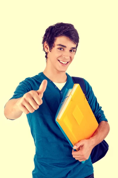 Young happy student showing thumbs up — Stock Photo, Image