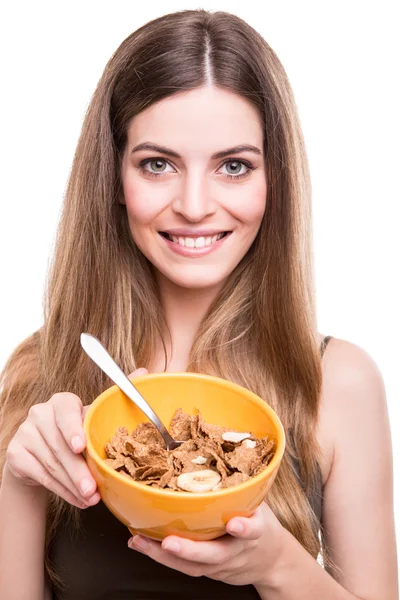 Nő étkezési gabona — Stock Fotó