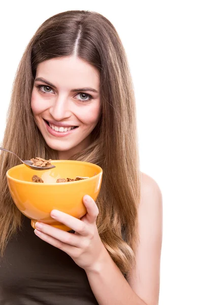 Žena jíst obiloviny — Stockfoto