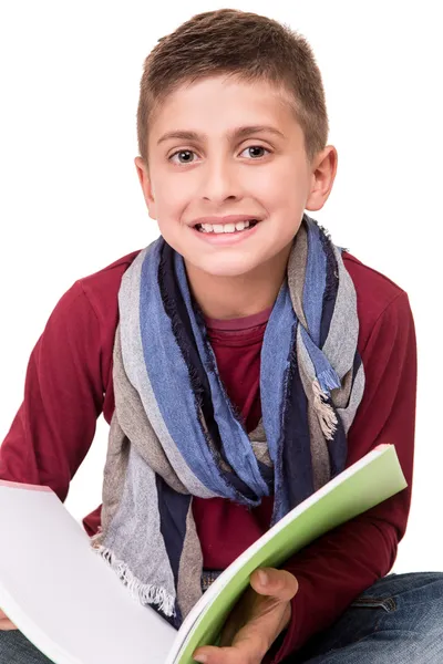 Jongen houden een schetsboek — Stockfoto