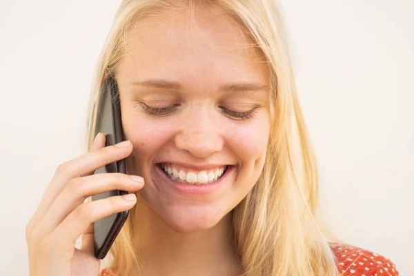 Blonde Woman Holding Smartphone Having Coversation Smiliing Outdoor Day Stock Picture