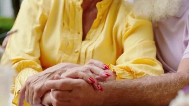 Closeup details in front of the camera posing amazing looking old couple smiling large they are very charismatic. 4k