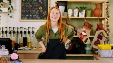 Concept of small business and entrepreneur beautiful with a cute smile barista lady dancing while waiting for the customer at the coffee shop