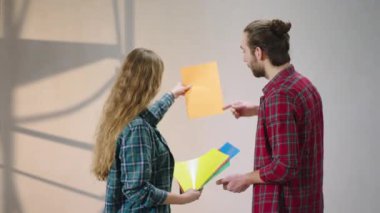 Amazing couple have a plan to painting the wall in their house they using a colour palette to choose the best colour for their wall.