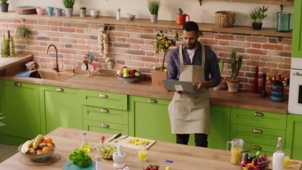 Modern Kitchen Taking Video Form Guy Using Laptop Make Video — Vídeo de Stock