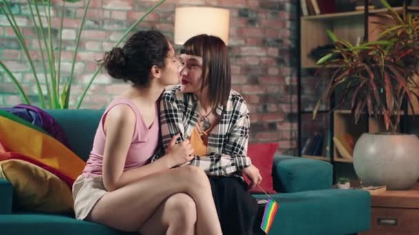 Very Romantic Lesbian Couple Sofa Hugging Each Other Holding Lgbt — Stockvideo