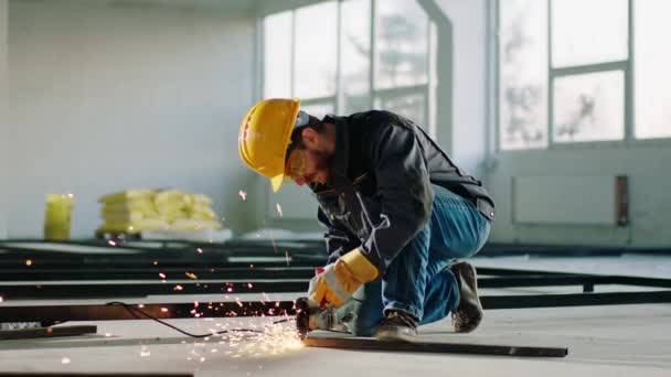 Large Construction Site Hard Working Man Using Disc Welding Machine — Stock videók