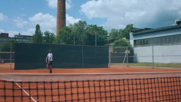 Handsome Man Tennis Player Hitting Tennis Ball Racket Outdoor Tennis — Vídeo de stock