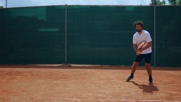 Sunny Day Good Looking Man Tennis Player Hitting Ball Racket — Stok video