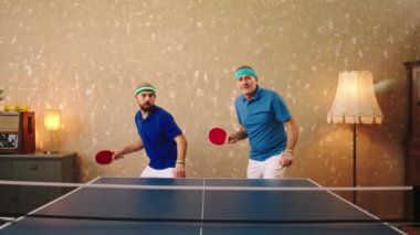 Attractive two men playing concentrated the ping pong they loose the ball and get upset concept of healthy lifestyle sport and health. 4k