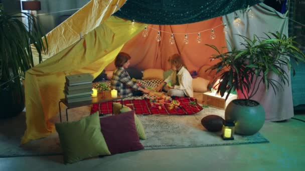 Very Hippy Looking Sheet Tent Plants Two Boys Curiously Playing — Stock video