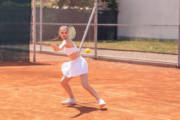 Good Looking Young Woman Professional Tennis Player Hitting Ball Hard — Fotografie, imagine de stoc