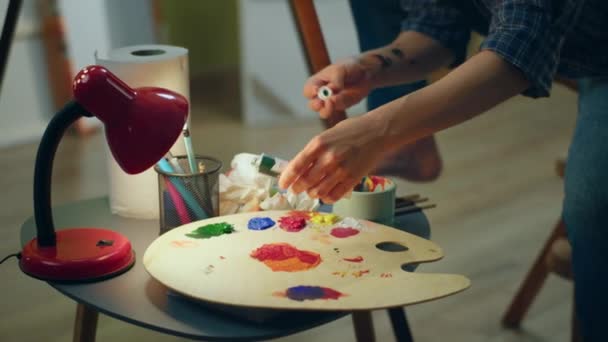 Artistic Woman Squeezing Out Paint Her Large Art Palette Beginning — Wideo stockowe