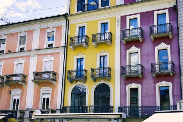 view to the color facades of houses in city